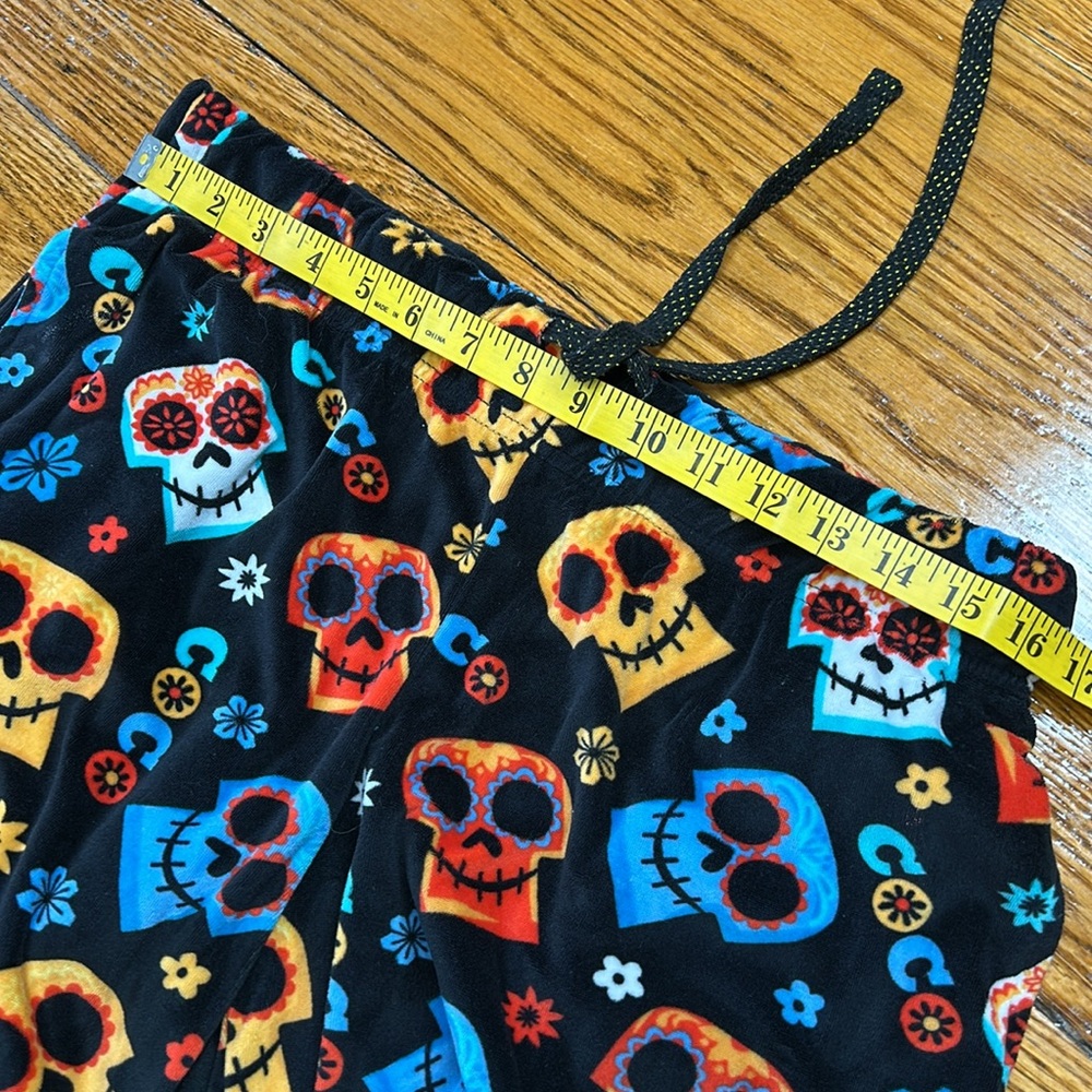 Disney Pixar Coco theme velour pajama pants. Black w/colorful skulls. Size Large - Picture 7 of 10